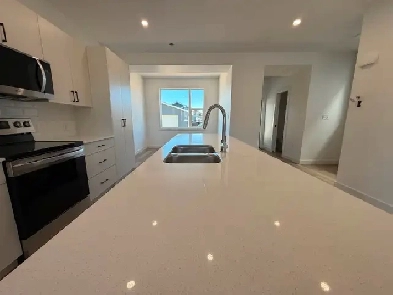 BRAND NEW 3 BEDROOM 2.5 BATH TOWNHOUSE IN BLACKFALDS Image# 1