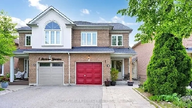 This incredible Vaughan semi is renovation royalty. Step into a Image# 1
