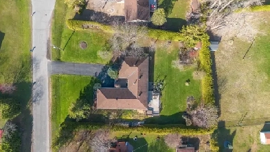 4-Bed   Den Bungalow w/ Oversized Garage on ½ Acre | Greely Image# 10