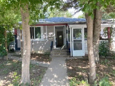 Own laundry, pet friendly, 2 bedroom main floor of a house in No Image# 1