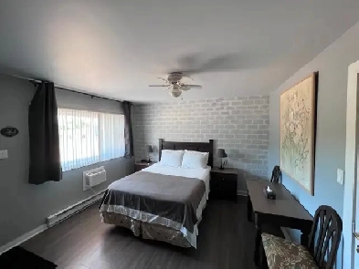 Cozy Bachelor with Private Bath at Restwell Motel Image# 10