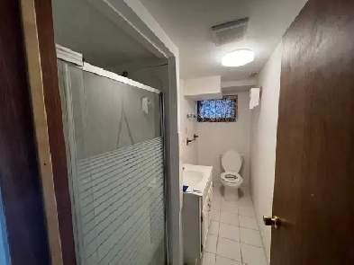 Room for rent sharing or private in  bungalow basement. Image# 1