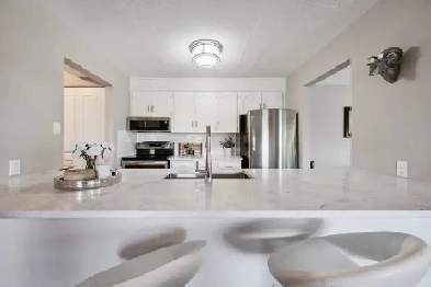 Spacious Corner Condo with $100K in Upgrades & Prime Location Image# 1
