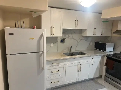 Spacious 1-Bedroom Basement Apt – All-Inclusive, Parking, Wi-Fi Image# 1