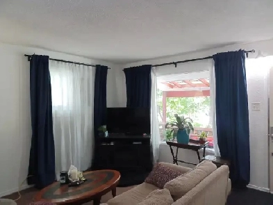 Pet friendly 2 bedroom main floor house, own laundry fenced yard Image# 1