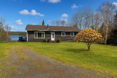 Nestled on a sprawling lot, charming one-level bungalow Image# 1