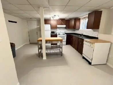 2 bedroom plus den basement suite Image# 1