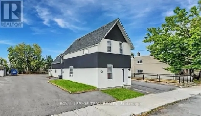 Fully Rented Triplex | Rare 4-Lot Assembly Potential Image# 1