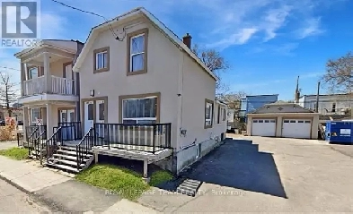 Fully Rented Triplex | Strong Cap | 50x100 Lot Image# 1