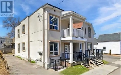 Triplex with Strong Cap Rate – Prime Investment Opportunity! Image# 1