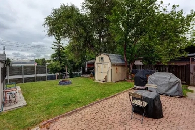 PRICE DROP! AFFORDABLE CANYON MEADOWS BUNGALOW ON A LARGE LOT Image# 2