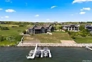 SPRAWLING AND SPECTACULAR LAKESIDE OASIS AT SUNDALE! Image# 4