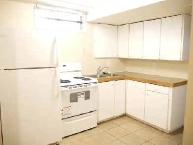 2 BR Bsmt INCLDS UTILITIES-Newr Bthrm/Windws, tile/hardwd fl/pet Image# 5