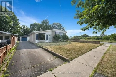 Turnkey Detached Home with Heated Basement Floors! Image# 1