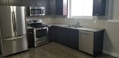 Exec. 3 Bed/2 Bath suite w/ Garage & All Utilities Inc. Internet Image# 1