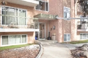 Spacious Top-Floor 2 Bedroom Condo-Investment Property-$124,900 Image# 1