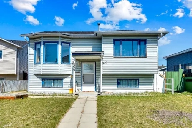 Bi-Level 4 bedroom 2 full baths 2 bedroom suite double garage Image# 4