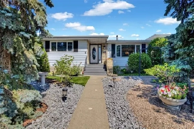 Immaculate Bungalow Backing Green Space! Image# 9