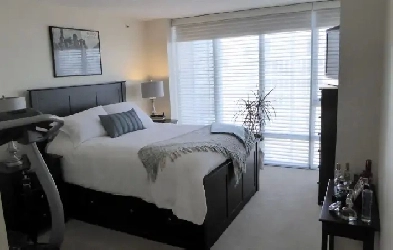 Spacious Private Room in High-Rise Apartment – All Utilities Image# 1