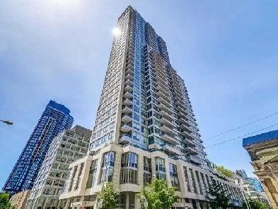 Spacious 2 bedroom - 2 bathroom condo in downtown Image# 26