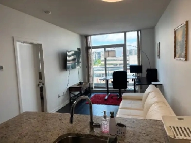 Stunning 1-Bedroom Condo with Breathtaking City Views Image# 2