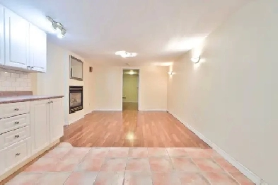 BRIGHT 1 BED Basement apartment in Leslieville with bus at door Image# 1