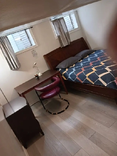 A brand new private day room with a queen-size bed Image# 2