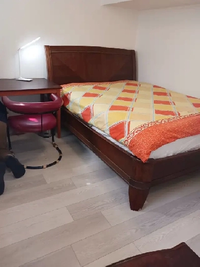 A brand new private day room with a queen-size bed Image# 4