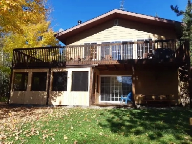 Chalet au bord du l’eau à louer à St-Zénon. À 1h30 de Montréal! Image# 1