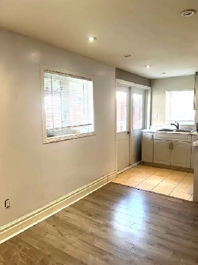 Bright and Spacious 2-bedroom  Apartment Walkout to Backyard Image# 1