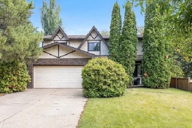 SPACIOUS 2 STOREY HOME SIDING & BACKING PARK IN LACOMBE! Image# 6