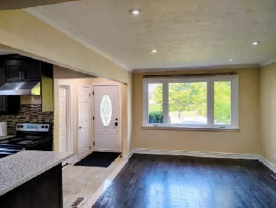 Open concept 3 bedroom main floor available. Image# 3