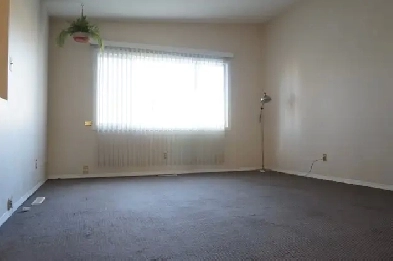 2 Bedroom   Den Main Floor Half Duplex 43 St SE Image# 1