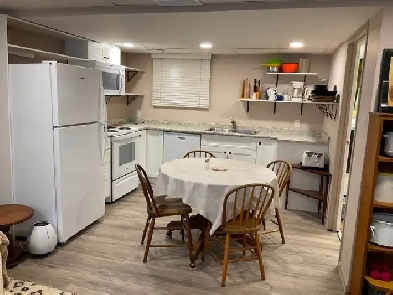 Furnished room w/ kitchen , bath, living area , shared laundry Image# 9
