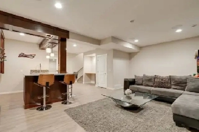 Modern oversized and custom-built walkup basement level suite Image# 3