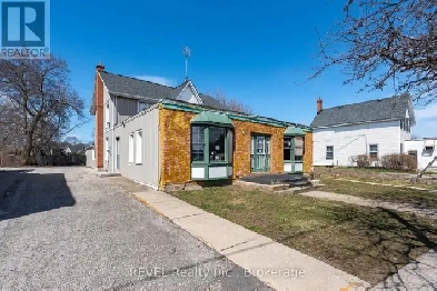 Commercial Building with Rental Apartment in Growing Community Image# 1