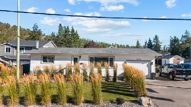 4-Bed Home in Glenmore - Huge Yard & Carriage House Potential Image# 1
