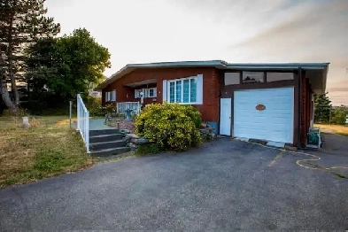 Brick Bungalow.  3/4 acre lot  ocean view Image# 1