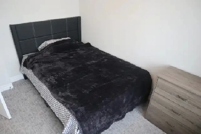 Private room with private washroom in shared townhouse Image# 1