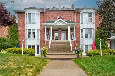 Condo 2 chambres devant un lac à La Prairie Image# 1