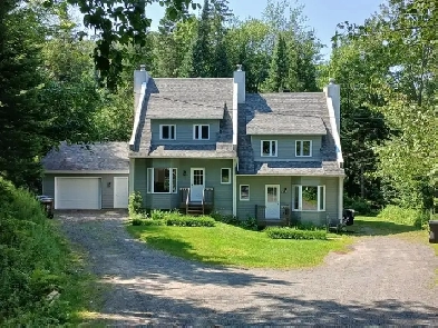 Saint-Sauveur.  2 Jumelés Côte à Côte   garage  850 000$ Image# 2