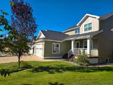 7128 Henner's Road, Lacombe, AB - Family Home Backing onto Park Image# 1