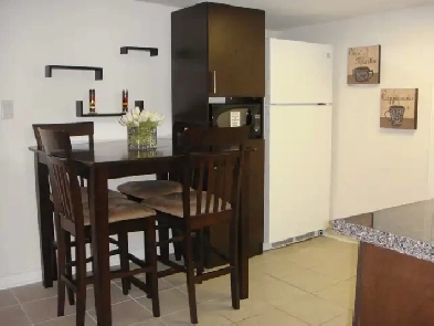 Three bedroom furnished basement apartment Image# 1