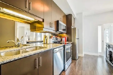 Marilyn Munroe Bldg - Open Concept Floor to Ceiling Window Image# 1