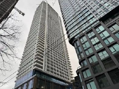 New 1 Bed plus Den Condo with 2 Bathroom near Queen/Church Image# 1