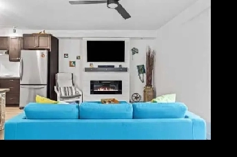 Two bedroom unit located at 200 Palliser Lane, Canmore. Image# 1