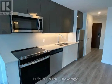 Modern 1 Den Condo at DTK – Steps to LRT & Google | $1,790/month Image# 1