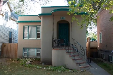 large two bedroom bright stylish main floor suite Image# 1