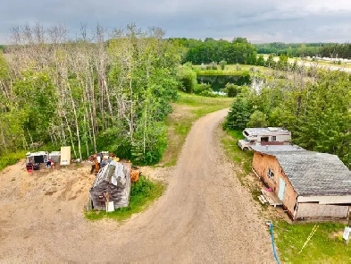 ACREAGE-  10.01 ACRES BETWEEN GRIMSHAW & PEACE RIVER Image# 1