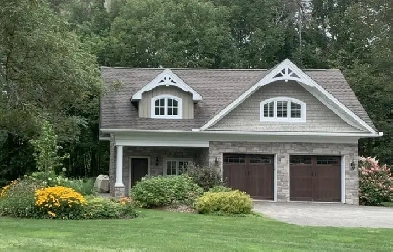 PICTURESQUE Waterfront CARRIAGE HOUSE in Huntsville Image# 1